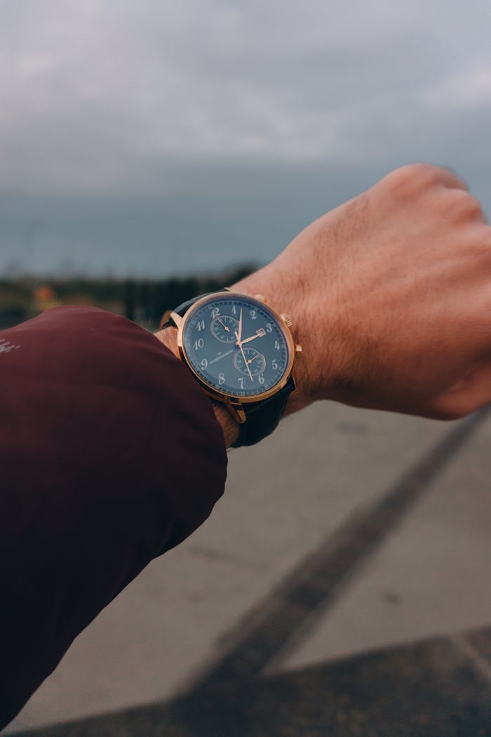 services-02 Close-up of a stylish wristwatch against a cloudy sky outdoors in Türkiye.